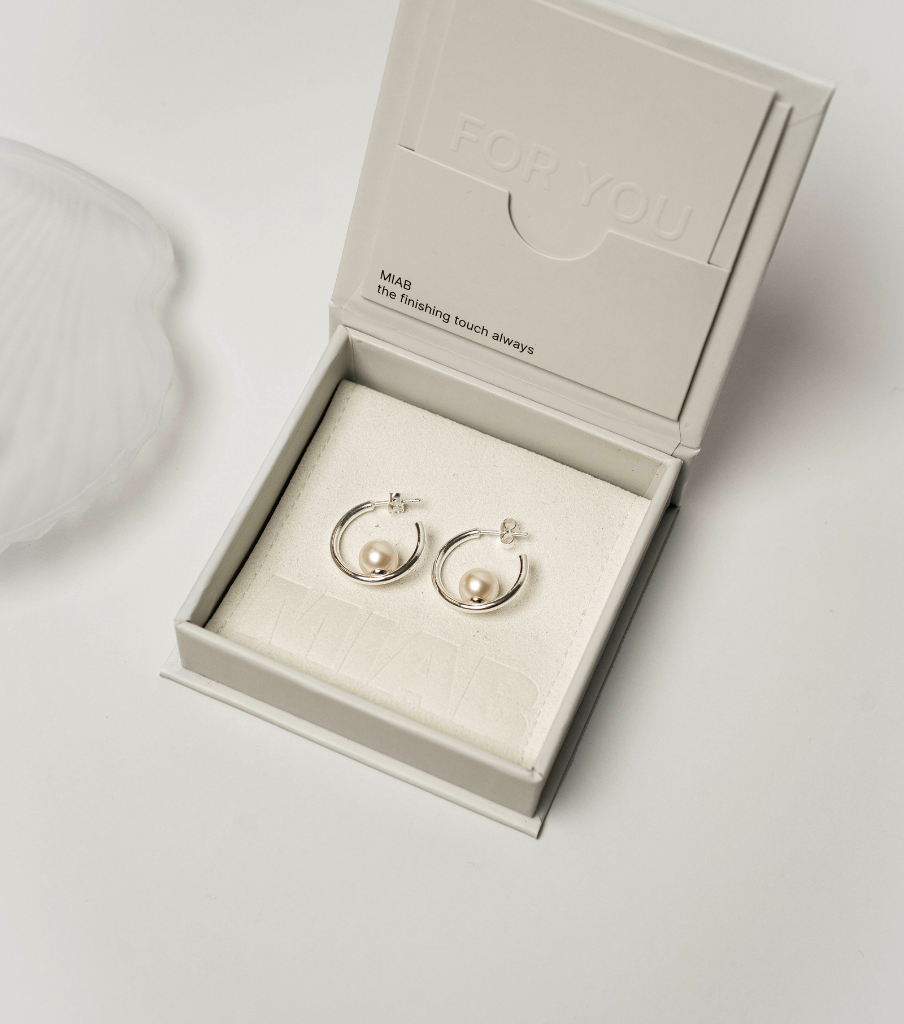Oorbellen - floating pearl