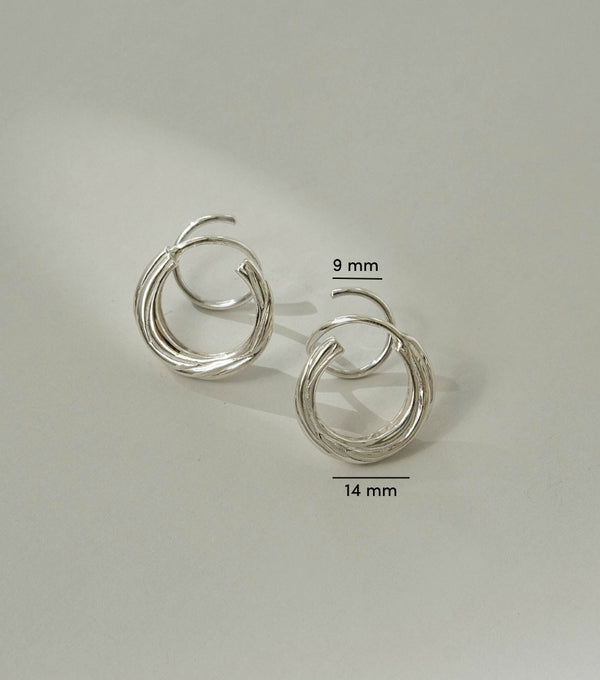 Earrings - carved twister
